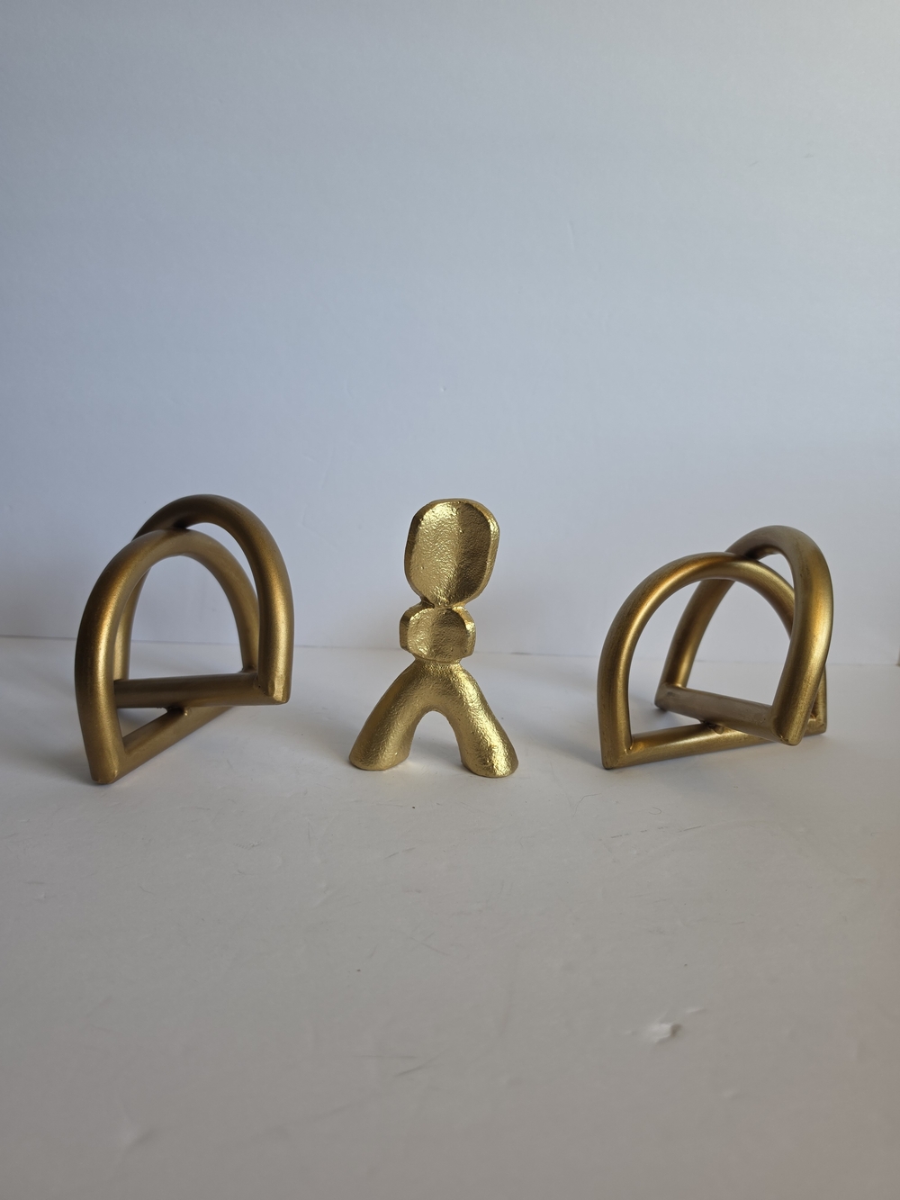 Gold Metal Bookends Or Statues with Abstract Figurine
